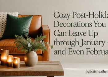Think textured throws, softly glowing lanterns, and greenery that whispers “mountain retreat” instead of “merry and bright.” I