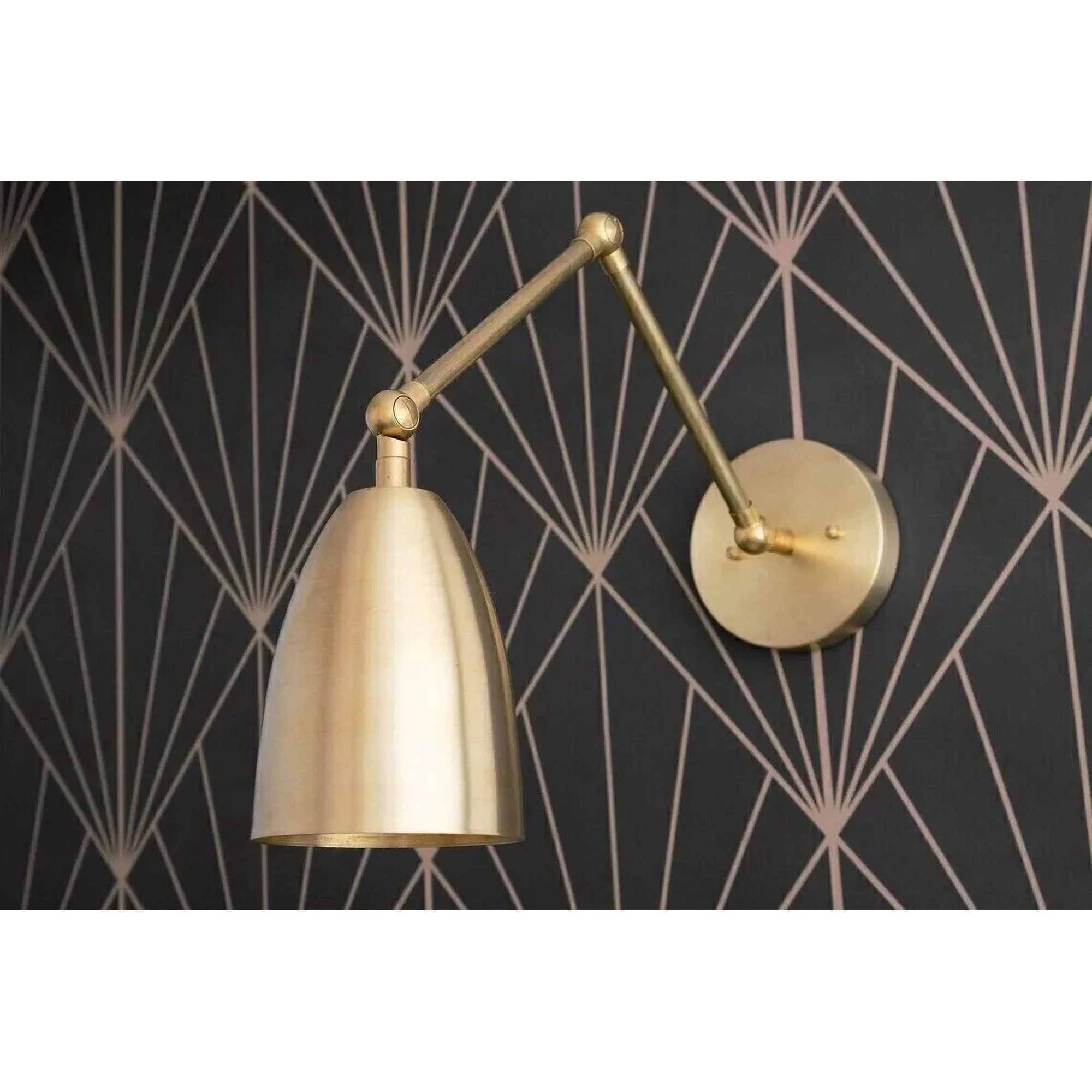 Lighting is the jewelry of your room. These sconces bring a touch of traditional library vibes into a modern space.